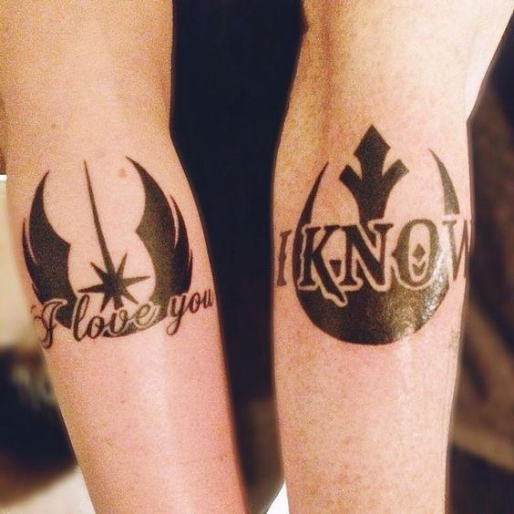 Awesome black ink Star wars emblems tattoo on forearms with lettering