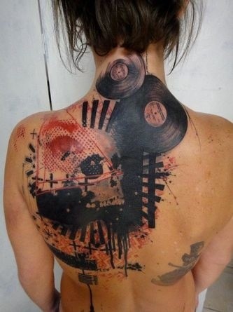 Awesome black red colors skull with gramophone records trash polka tattoo on back
