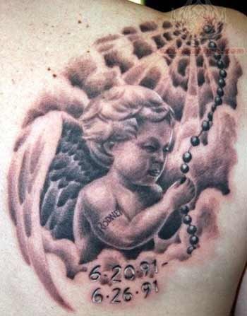 Awesome cherub baby memorial tattoo