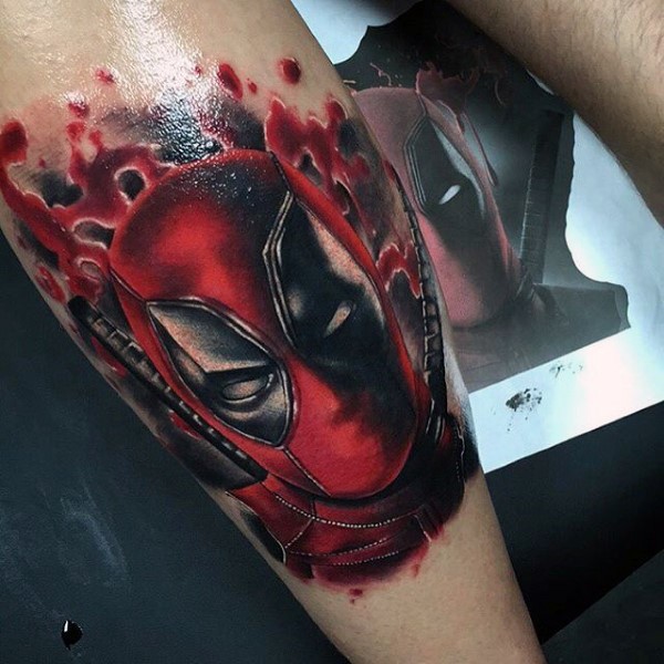 Awesome colored bloody Deadpool face tattoo