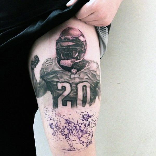 Awesome colored thigh tattoo of American football player