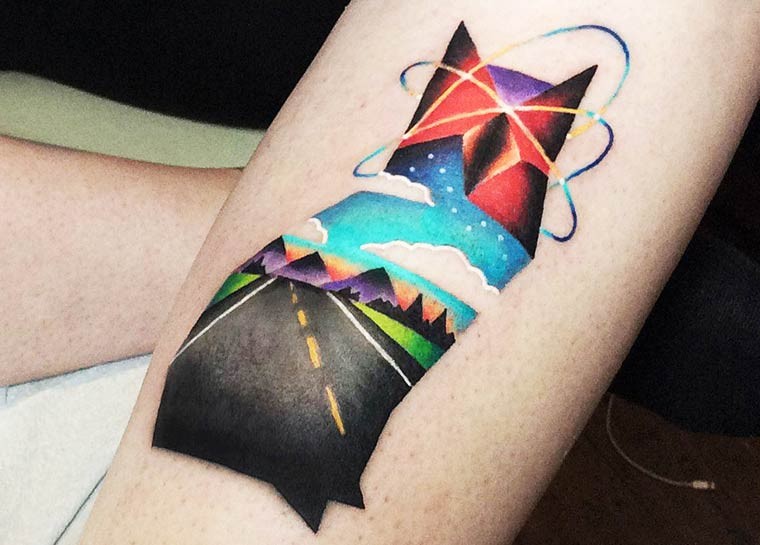 Awesome combined colored arm tattoo of cat stylized with rose and mountains by David Cote