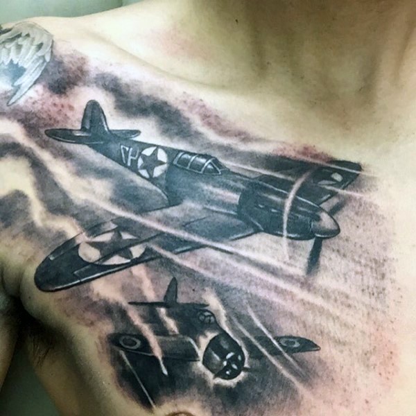 Awesome cool painted WW2 fighter planes tattoo on chest