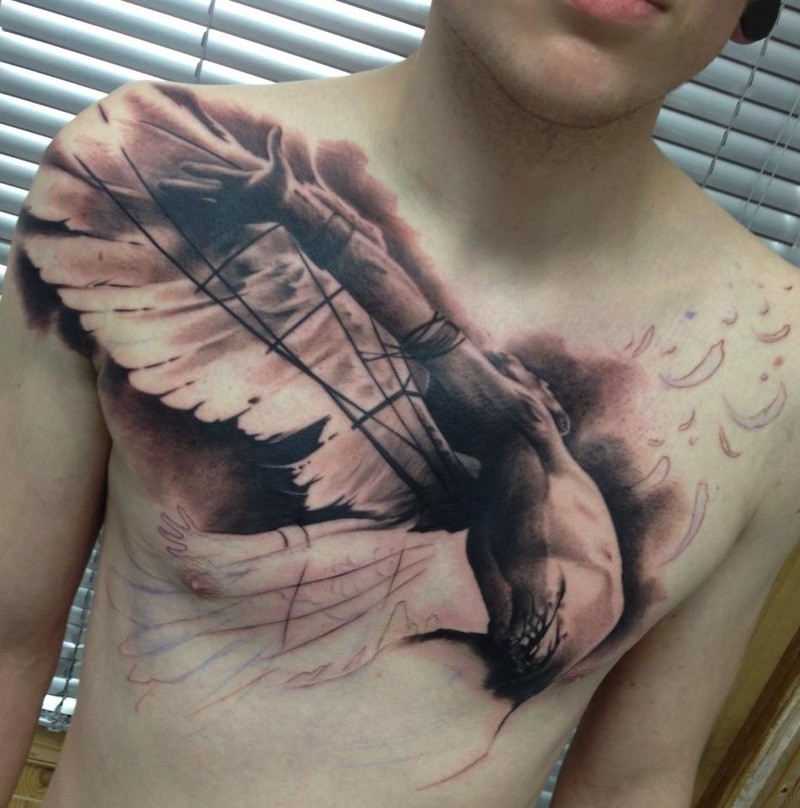 Awesome flying man with wings tattoo on chest