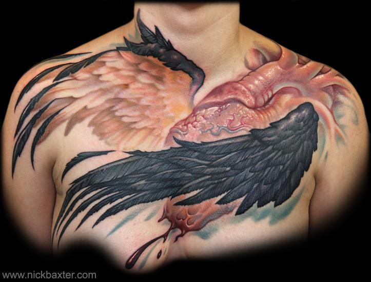 Awesome heart with wings of a bird tattoo on chest by Nick Baxter