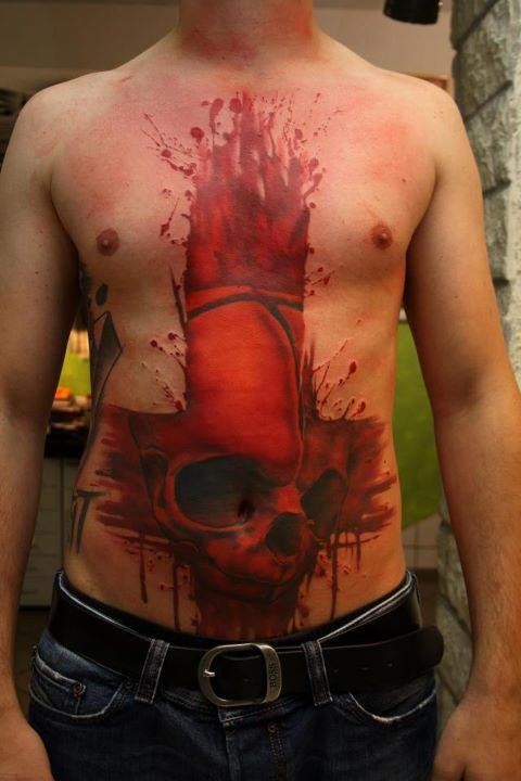 Awesome idea of skull tattoo on stomach