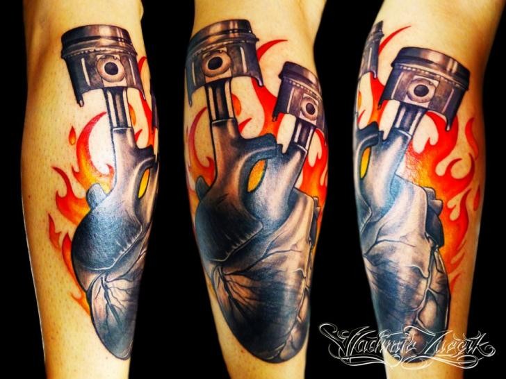 Awesome illustrative style arm tattoo of human heart with pistons