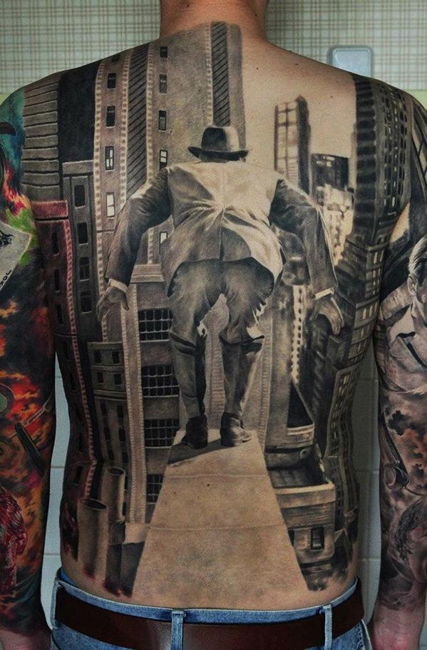 Awesome jump from a height tattoo on whole back