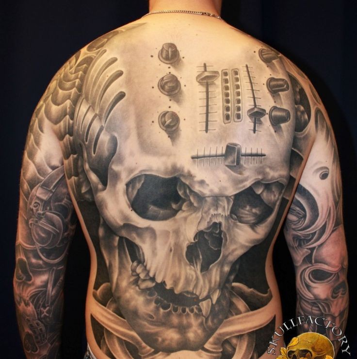 Awesome large black and white musical skull with microphone tattoo on whole back
