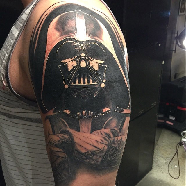 Awesome looking colored shoulder tattoo of Darth Vader