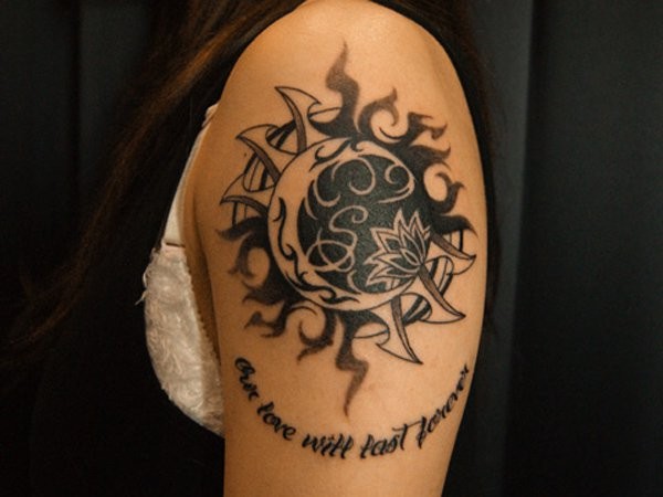Awesome moon and sun with flower tattoo on shoulder
