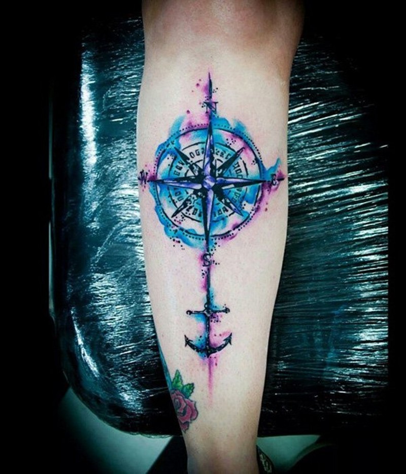 Awesome multicolored nautical tattoo with big compass on hand