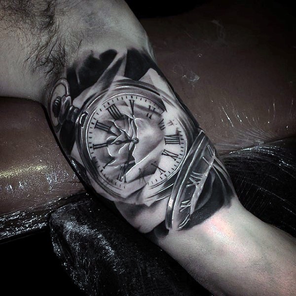 Awesome natural looking black and white old clock tattoo on arm