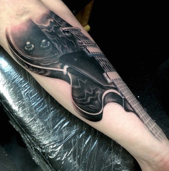 Awesome painted and designed black and white guitar tattoo on arm