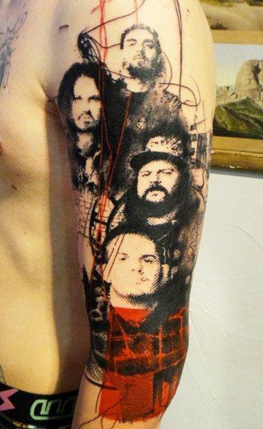 Awesome painted colored famous people arm tattoo