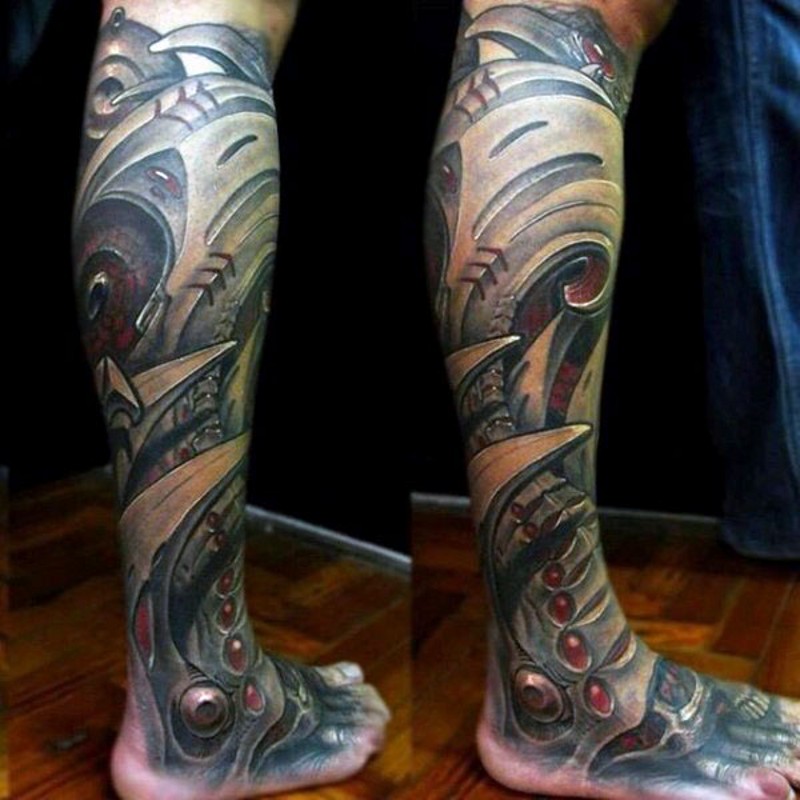 Awesome painted detailed and colored alien like armor tattoo on leg