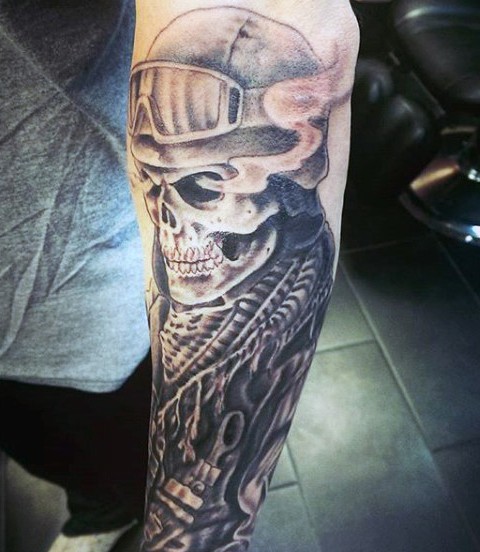 Awesome painted detailed black and white skeleton bike rider tattoo on arm
