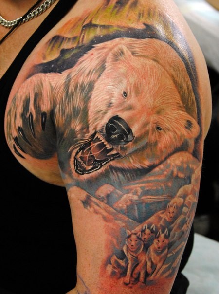 Awesome polar bear with dog team tattoo on shoulder