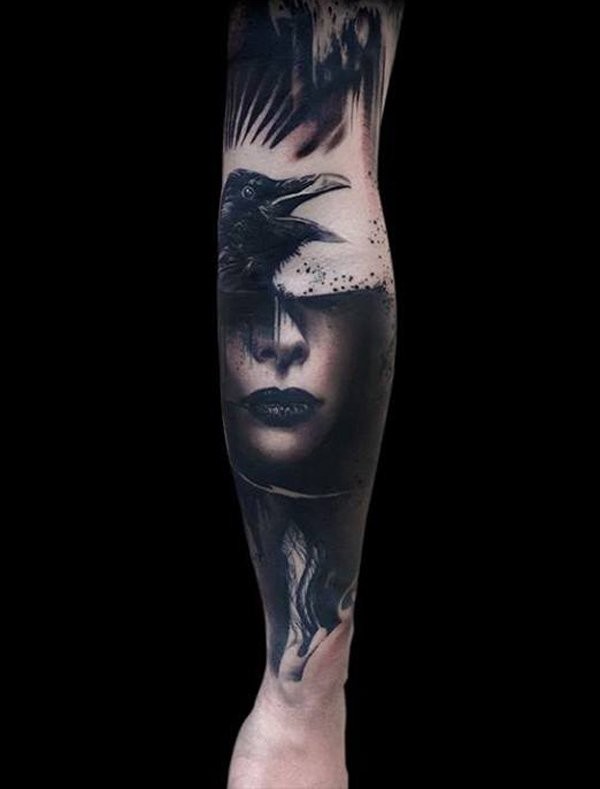 Awesome portrait of a woman and raven tattoo on forearm