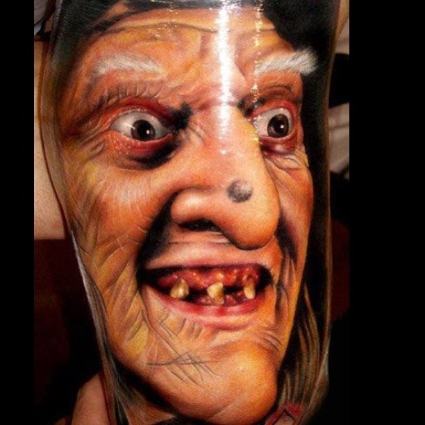 Awesome realism style very detailed ugly witch tattoo