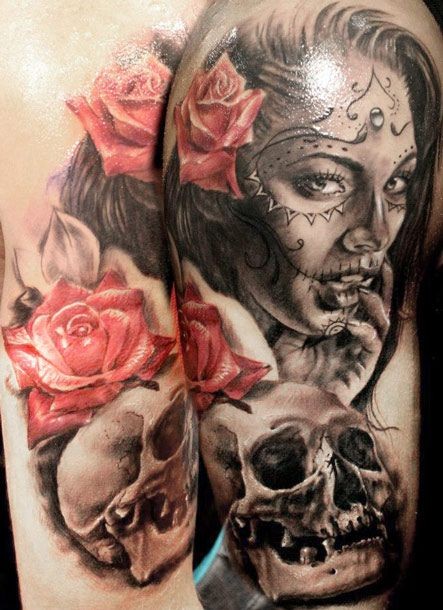 Awesome santa muerte girl with red roses and skull tattoo