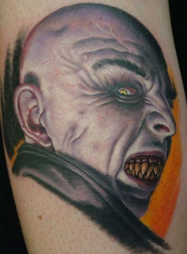 Awesome scary vampire man tattoo