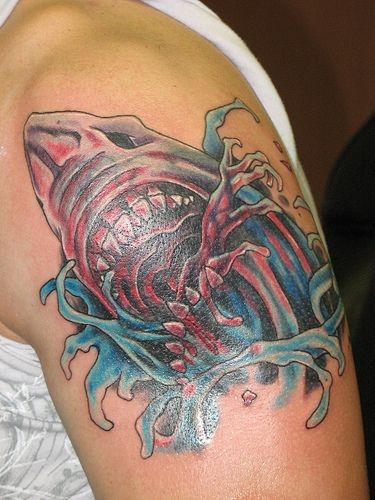 Awesome shark with bloody jaws tattoo on shoulder