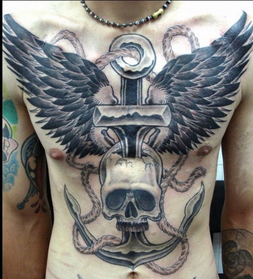 Awesome skull and anchor and wings tattoo on chest
