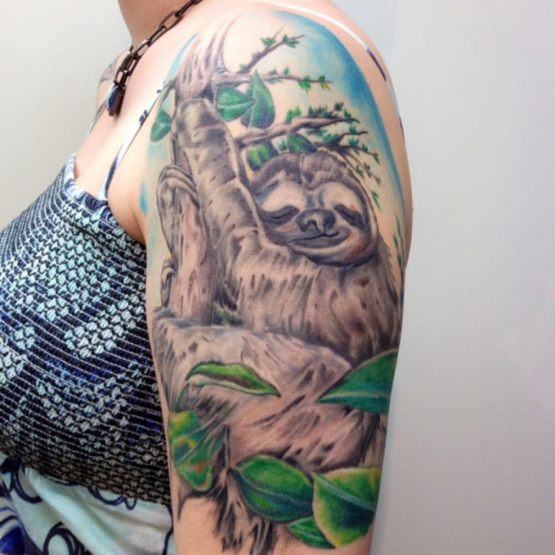 Awesome sleeping sloth tattoo on half sleeve