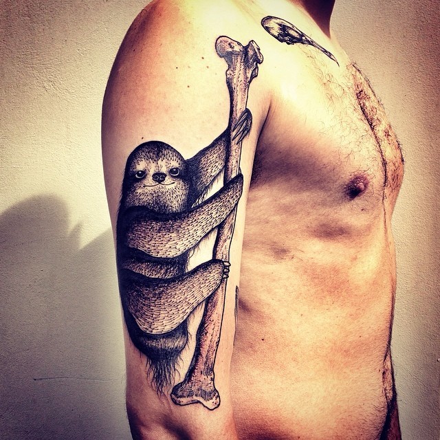 Awesome sloth crawling on bone tattoo on half sleeve