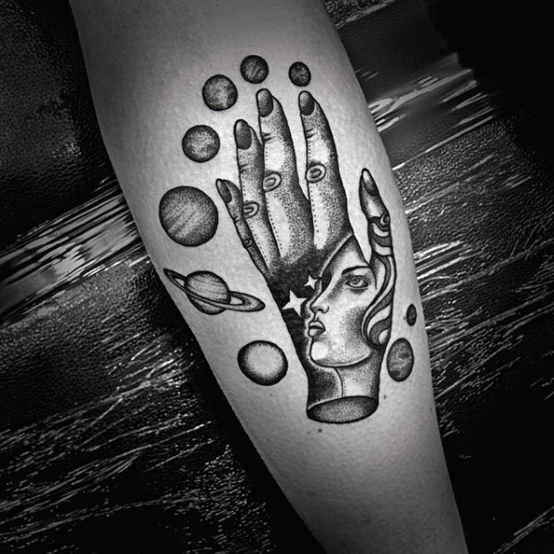 Awesome space themed black and white tattoo on arm