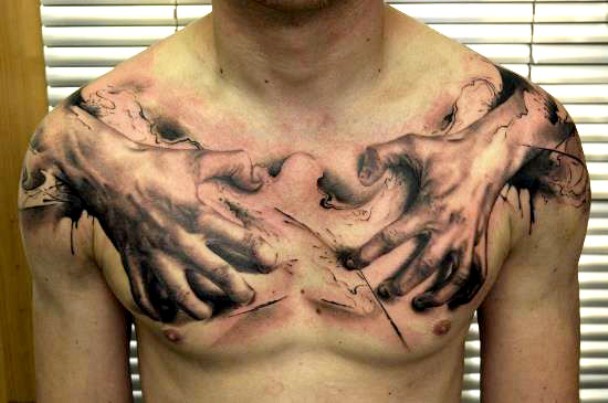 Awesome two hands tattoo on chest by Florian Karg