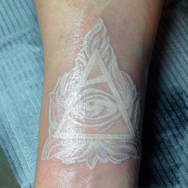 Awesome white ink colored Masonic pyramid tattoo on arm