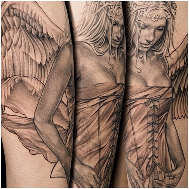 Beautiful angel girl tattoo by Niki Norberg