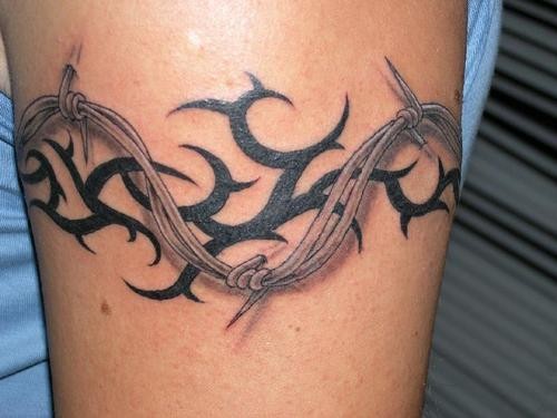 Beautiful barbed wire tribal armband tattoo