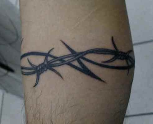 Beautiful barbed wire tribal tattoo