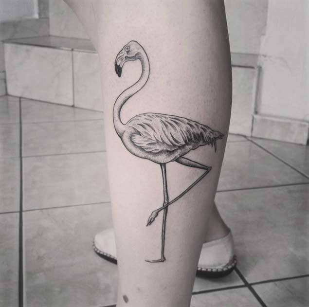 Beautiful black ink 3D like flamingo tattoo on leg