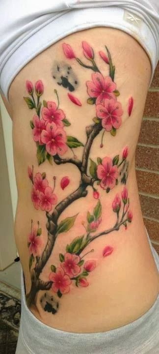 Beautiful colorful cherry blossoms tattoo on ribs