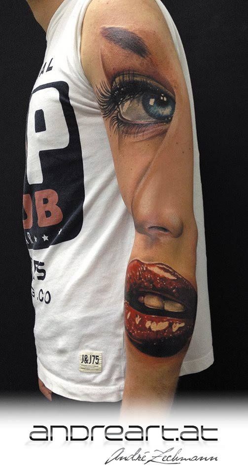 Tatuaje en el brazo, rostro de mujer maquillada