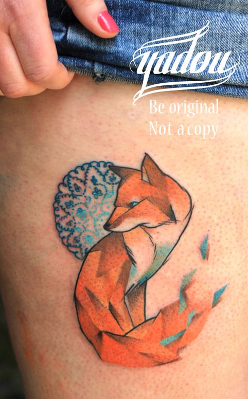 Beautiful geometric red fox tattoo on thigh