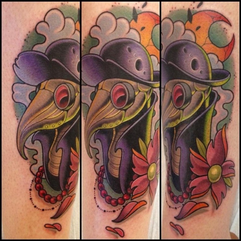 Beautiful illustrative style colored bird with hat and flowers tattoo on shoulder