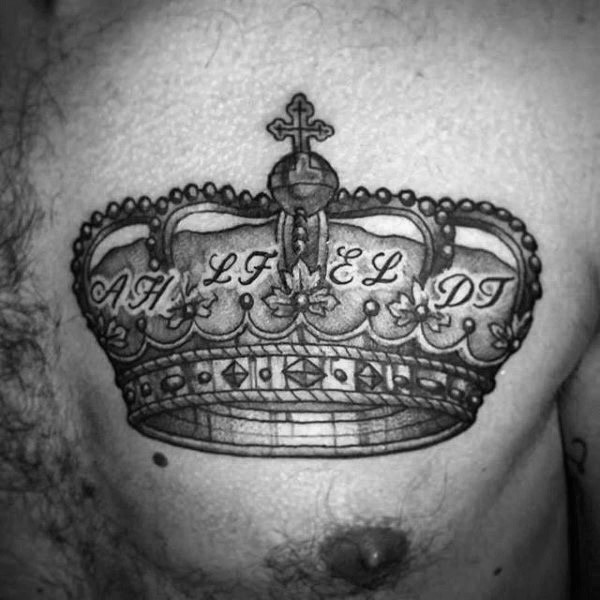 Beautiful looking black ink chest tattoo of crown with lettering