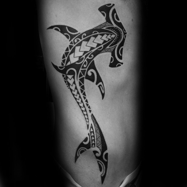 Beautiful looking black ink Polynesian style side tattoo of hammerhead shark