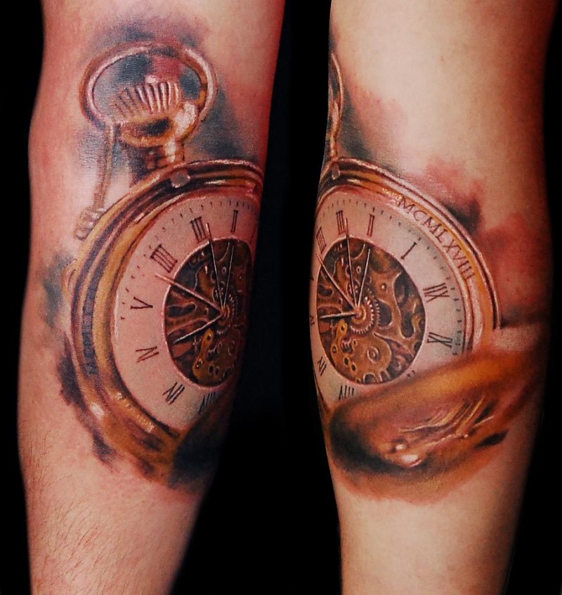 Beautiful looking colored arm tattoo of antic golden clock