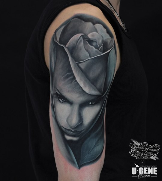 Beautiful looking colored arm tattoo of big rose stylized with woman face