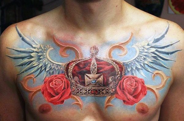 Beautiful looking colored chest tattoo of big crown with wings and flowers