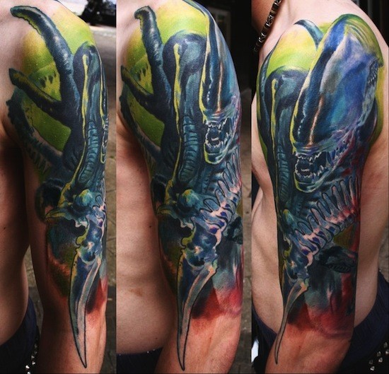 Beautiful looking colored half sleeve tattoo of impressive evil Alien