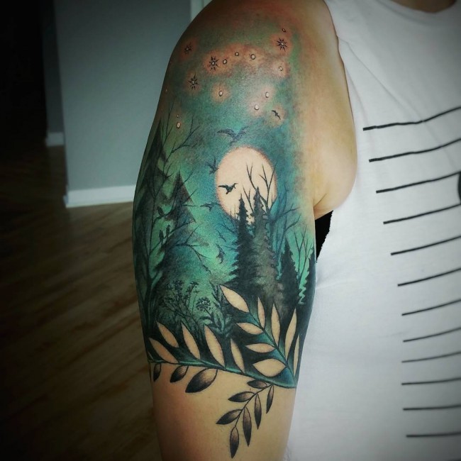 Beautiful looking colored night forest tattoo on shoulder with birds and stars