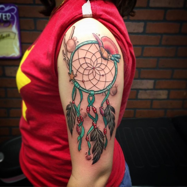 Beautiful looking colored shoulder tattoo fo dream catcher