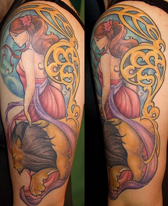 Beautiful looking colored shoulder tattoo of woman with lion